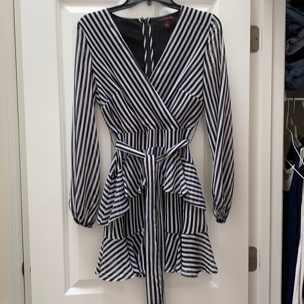 Mini dress with ruffles, very flattering tie waist, great for weddings.